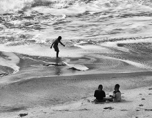 Photo of three boys on a beach